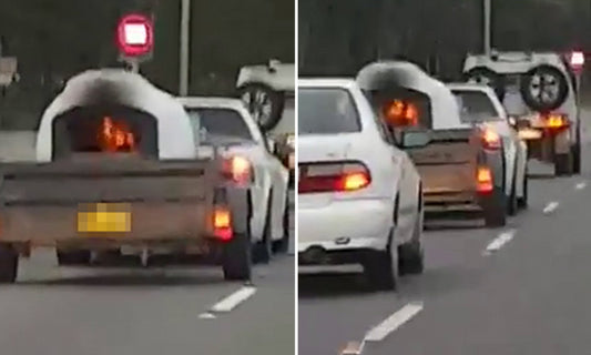 Watch: Brave Australian Drives Down Highway With Burning Pizza Oven (Video)