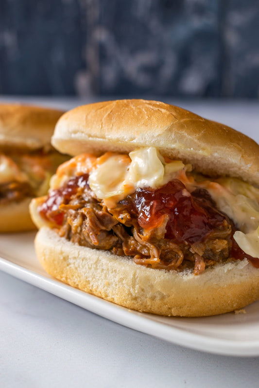 Slow Cooker Pulled Pork Cranberry Slaw Sliders