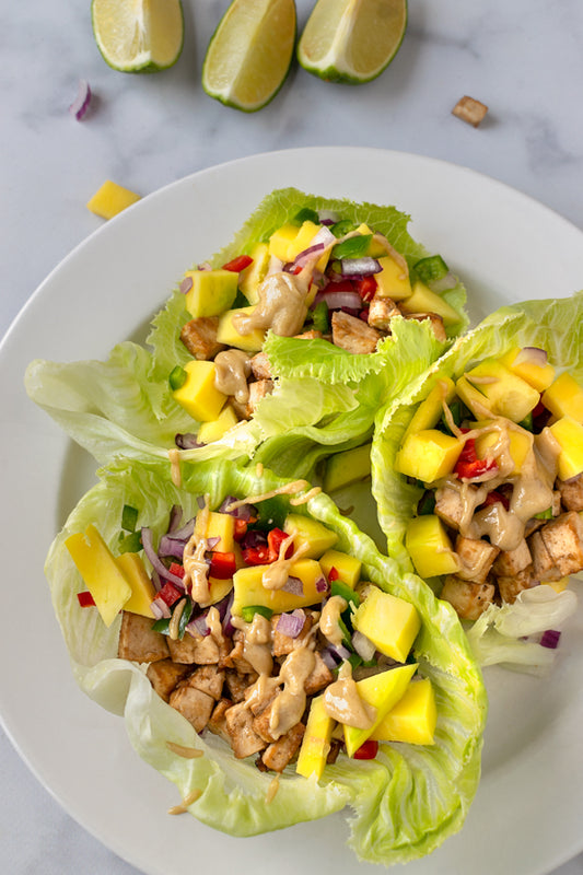 Thai Mango Cabbage Wraps with Crispy Tofu and Peanut Sauce