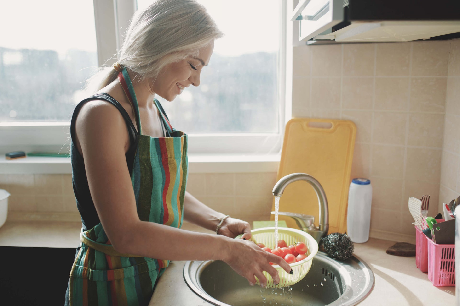 Every chef needs this adjustable silicone clip-on strainer for